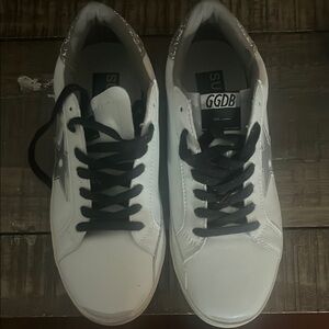 Women’s Golden Goose sneakers size 10, never worn.